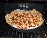 Foto del paso 12 de la receta Coca de masa brisa con tomate, pimiento y atún