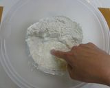 A picture of step 2 of Melt in Your Mouth Round Bread with Heavy Cream.