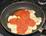 A picture of step 9 of Italian Sautéed Chicken Breasts in Tomato Sauce.