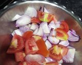 A picture of step 3 of Chole ragda with potato pattice.