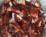 A picture of step 5 of My Pork Loin Ribs cooked in Sweet Baby Rays BBQ Sauce.