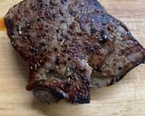 A picture of step 4 of Garlic fried rice with sliced grilled beef sirloin.