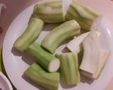 A picture of step 1 of Trombetta Squash with Tomato and Potatoes.