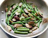A picture of step 4 of Pan Seared Chicken with Green Bean, Japanese Eggplant, and Muscadine Sauté.