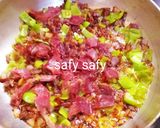 A picture of step 3 of Shakshuka with Eggs and Pastrami.