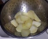 A picture of step 4 of Crispy Lemon Herb Roasted Potatoes.