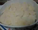 A picture of step 6 of Ladybirds Garlic & Sausage Potato Bake.