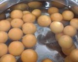 A picture of step 2 of Katta family's Kumquat jam.