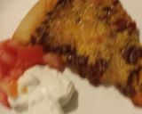A picture of step 5 of Taco pizza.
