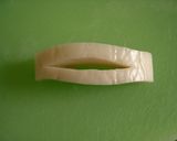 A picture of step 2 of Kamaboko Roses for a New Year's Bento.