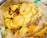 A picture of step 3 of Potatoes with mushrooms in a baking sleeve.