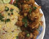 A picture of step 3 of Gobi manchurian with vegetables rice and chicken nuggets.