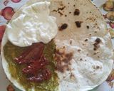 A picture of step 2 of Piadina with Octopus, Burrata, Pesto, Sun-Dried Tomatoes & Arugula.
