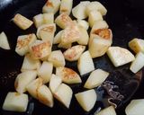 A picture of step 5 of Desi Spiced Chickpeas and Potatoes.