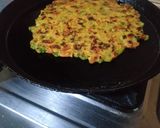 A picture of step 5 of Oats besan mix veg chilla.