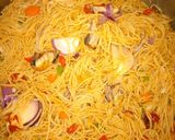 A picture of step 5 of Stir fried pasta with smoked fish.