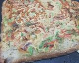 A picture of step 3 of Besan bread on griddle.
