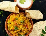 A picture of step 10 of Kathiyawadi Masala Khichdi.