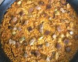 A picture of step 10 of Duck, Mushroom, and Foie Gras Paella.