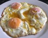 Runny fried eggs recipe step 2 photo