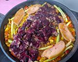 A picture of step 11 of Duck Breast Paella with Cranberries.
