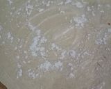 A picture of step 2 of Roll paratha in desi ghee.