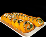 Foto del paso 10 de la receta: Rollo de pimientos de piquillo relleno de rúcula, queso de cabra y nueces
