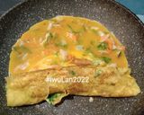 Foto langkah ke 4 dari resep Tamagoyaki Isi Sosis.