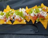 A picture of step 2 of Chessy Mango Nacho.