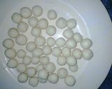 A picture of step 2 of Gullisuwa (fried milk balls).