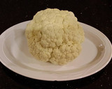 A picture of step 1 of Spicy Grilled Cauliflower with Sriracha Hollindaise Sauce.