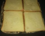 A picture of step 9 of Chicken Omlate covered sandwiches.