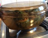 Une image de l'étape 14 de Courgettes rondes en cocotte farcies chair à saucisse et épices.