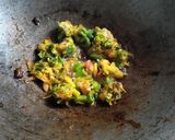 A picture of step 5 of Masala milk tea with spring onion pakoda.