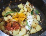 A picture of step 4 of Aloo Matar Dry.