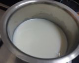 A picture of step 3 of Orange Tang Ice cream.