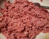 A picture of step 2 of Fluffy's homemade hash brown cheese burger.