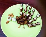 A picture of step 7 of Dryfruits sweet in Peacock pattern.
