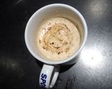A picture of step 7 of Hand beaten foamy coffee.