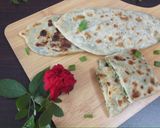 A picture of step 6 of Jingalov hats Armenian herb stuffed flatbread .