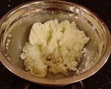 A picture of step 11 of Brownie Bottom Vanilla Butter Cake Cupcakes.
