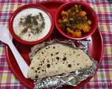 A picture of step 4 of Masala aalu,cucumber carrot raita with plain roti (simple Lunch).