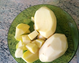 Foto del paso 5 de la receta: Patatas guisadas con calamar congelado