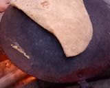 A picture of step 4 of Desi Masar and moong daal Mix on wood fire.