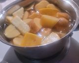 A picture of step 1 of Tater & Squash Mash Sweetened & Roasted w/Pecans.