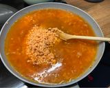 Foto del paso 5 de la receta: Curry de lentejas rojas con langostinos