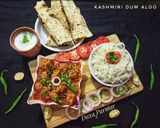 A picture of step 11 of Kashmiri Dum Aloo.