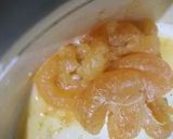A picture of step 2 of Koi komola, climbing fish curry with orange juice.