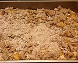 A picture of step 7 of Fresh Peach Cheesecake Crumble Bars.