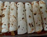 A picture of step 5 of Chicken Fajita Enchiladas.